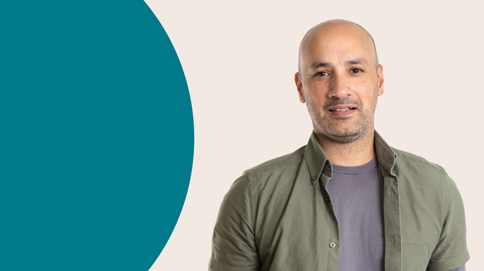 A horizontal banner that shows Trust for London ceo Manny Hothi. To his right is a large green semi circle, representing Trust for London's brand colours.